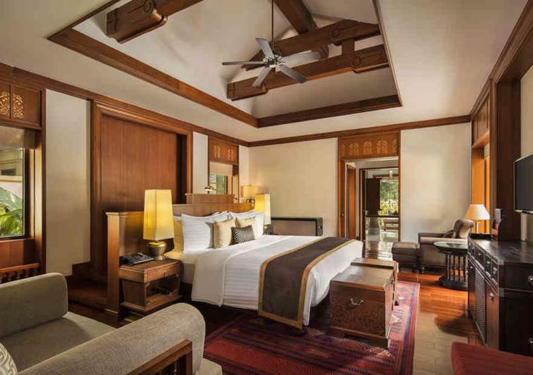 King bedroom of  two bedrooms villa with garden view