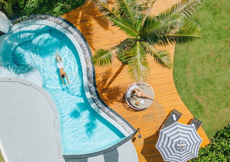 guests in beachfront pool villa