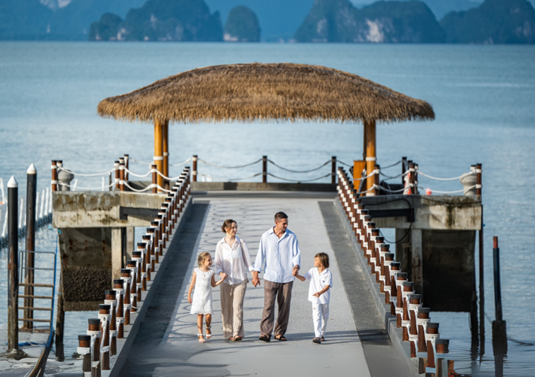 family at resort jetty
