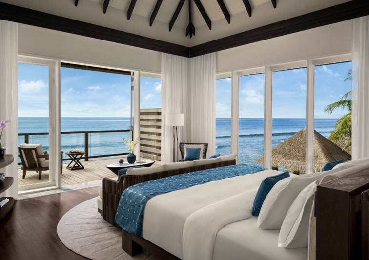 Bedroom view of the lagoon of the  Two Bedroom Beach Pool Residence at Naladhu Private Island Maldives